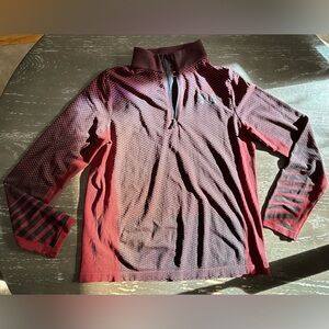 Kids size XL very lightweight,”loose Heatgear”long sleeved under Armour pullover